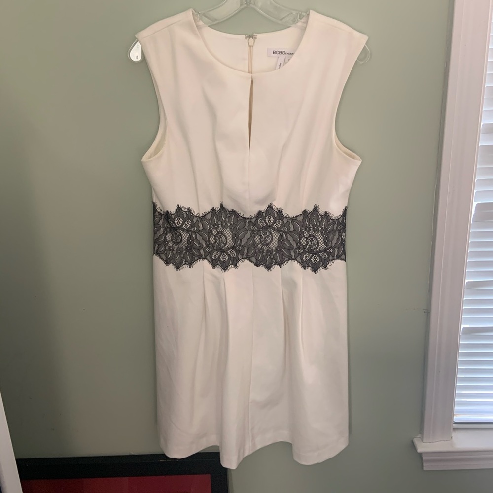 BCBG white fit and flare dress with black lace.